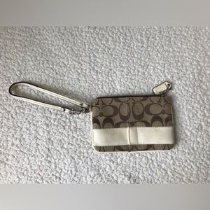 Coach brown and white wristlet